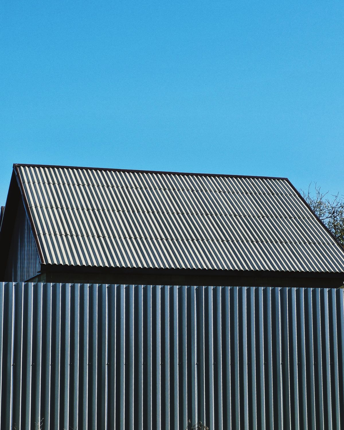Corrugated metal sheet roof on a shed